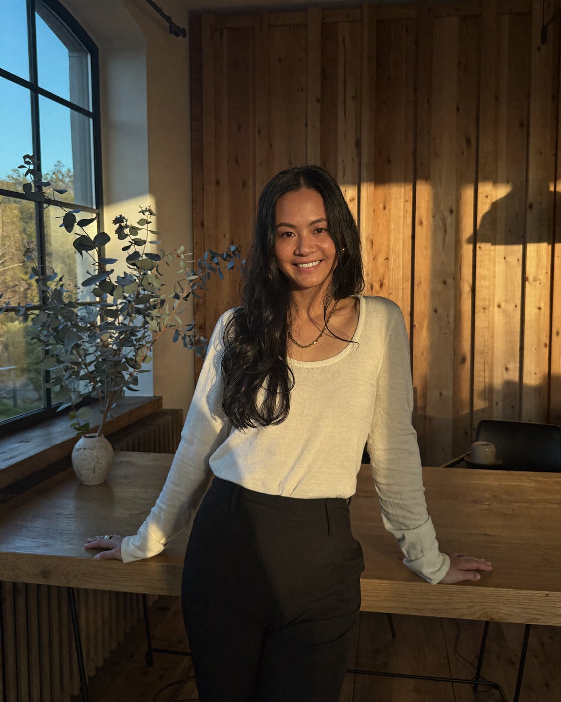 Jenn Yang, Director, DotVA + Editor, On Autopilot, at her desk in Melbourne